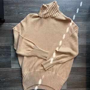 Women’s Oversized XS tan turtleneck.